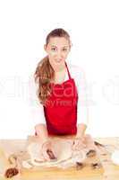 beautiful woman is baking cookies for christmas