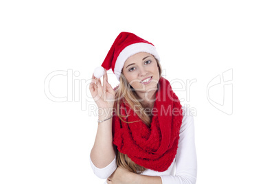 young beautiful woman with red scarf and christmas hat