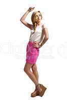 attractive young blonde woman with pink skirt isolated