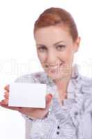 beautiful young girl is holding a blank card in hand isolated