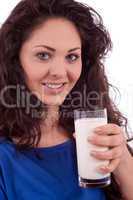 beautiful smiling woman is drinking milk