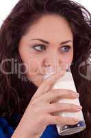 beautiful smiling woman is drinking milk