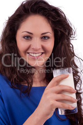 beautiful smiling woman is drinking milk