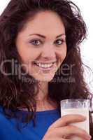 beautiful smiling woman is drinking milk