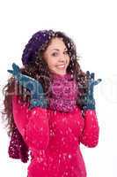 beautiful smiling brunette woman in snow in winter
