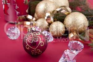 beautiful golden christmas decoration on red background