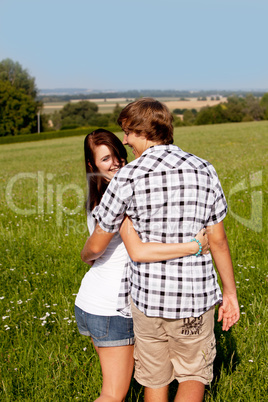 young love couple smiling outdoor in summer