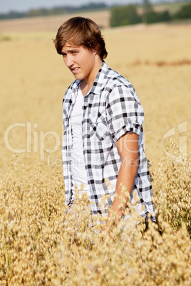 happy couple in love outdoor in summer on field