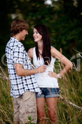 young love couple smiling outdoor in summer