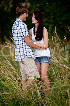 young love couple smiling outdoor in summer