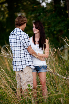 young love couple smiling outdoor in summer