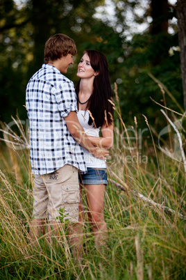 young love couple smiling outdoor in summer