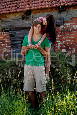 young couple in love having fun in summer outdoor