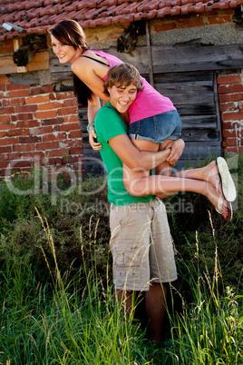 young couple in love having fun in summer outdoor