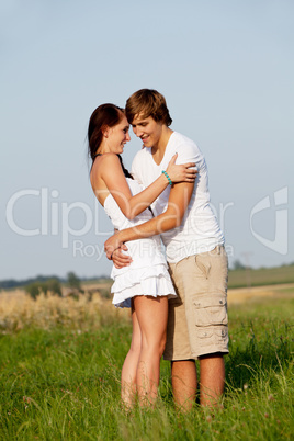 young love couple smiling outdoor in summer