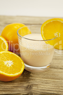 fresh tropical orange yoghurt shake dessert on table