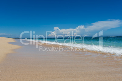 Beautiful tropical beach with lush vegetation