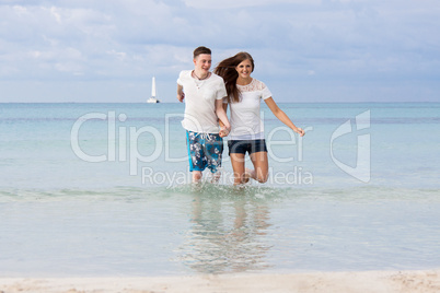 young happy couple in summer holiday vacation summertime