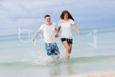 young happy couple in summer holiday vacation summertime