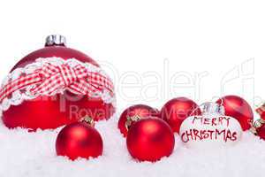 christmas decoration festive red bauble in snow isolated