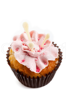 sweet tasty homemade cupcake with strawberry cream isolated
