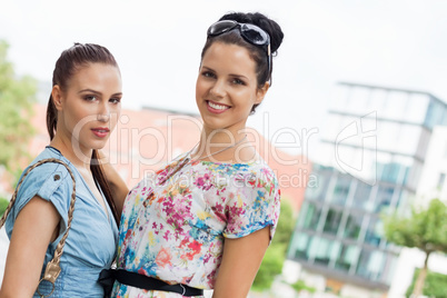 two attractive woman girlfreinds in summer outdoor