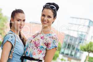 two attractive woman girlfreinds in summer outdoor