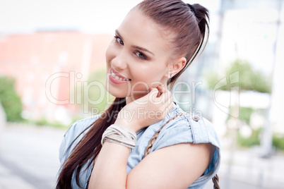 young attraktive happy woman outdoor in summer