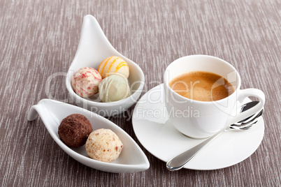 sweet delicious truffle pralines chocolate and hot espresso coffee