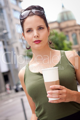 attractive woman with sunglasses in the city summertime