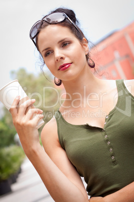 attractive woman with sunglasses in the city summertime