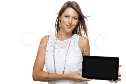 Woman chatting on a mobile while reading a tablet