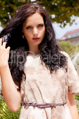 beautiful brunette woman fashion outdoor in summer