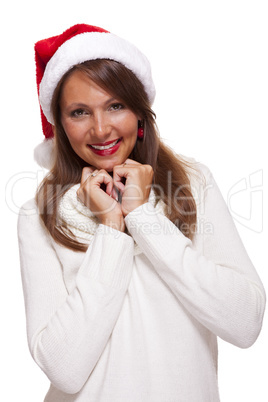 Attractive woman wearing a festive red Santa hat