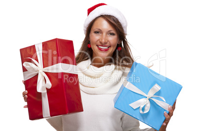 Vivacious woman in a Santa hat celebrating Xmas