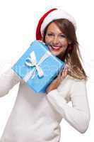 Beautiful vivacious woman with a Christmas gift