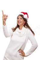 Young woman in a Santa hat holding out her hands