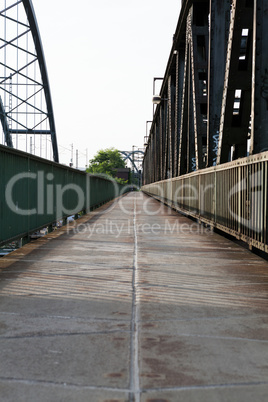 Empty railroad tracks on scale bridge