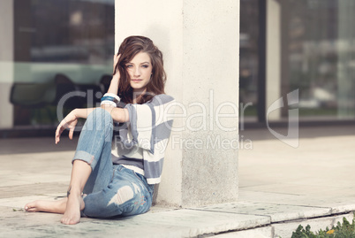 attractive woman barefoot in summertime outdoor