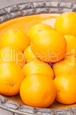 fresh orange fruits decorative on table in summer