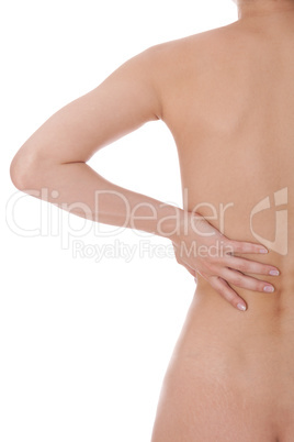 Woman caressing her bare shoulder and back