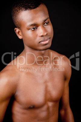 young african man with dark skin looking