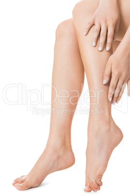 Elegant long bare female legs