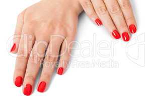 Woman with beautiful manicured red fingernails