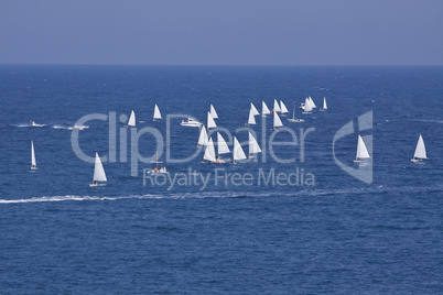 sailboat sport regatta on blue water ocean summer