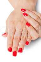 Woman with beautiful manicured red fingernails