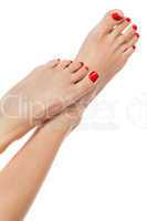 Female feet with red nails