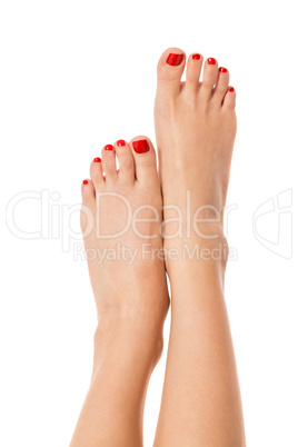 Female feet with red nails