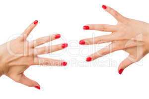 Woman with beautiful manicured red fingernails