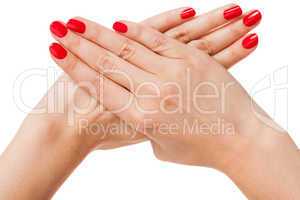 Woman with beautiful manicured red fingernails